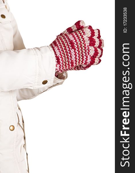 Woman hand in colorful and warm gloves isolated on white