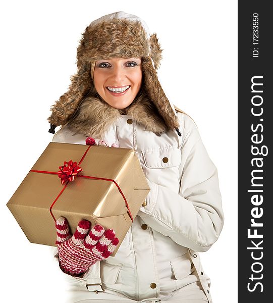 Caucasian blond woman in furry hat and christmas gifts isolated on white