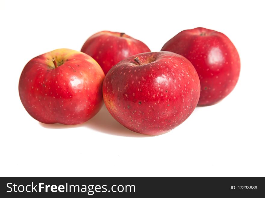 Fresh red juicy natural apples on white isolated background. Fresh red juicy natural apples on white isolated background