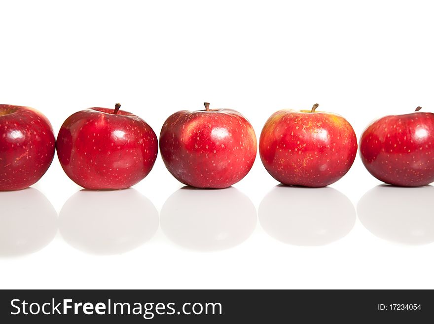 Fresh red juicy natural apples on white isolated background. Fresh red juicy natural apples on white isolated background