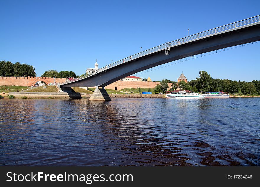 Pedestrian bridge across the wide river