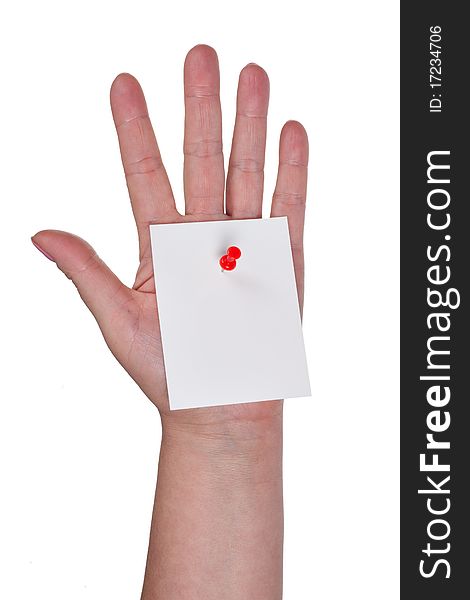 Sheet of paper pinned to a hand on a white background