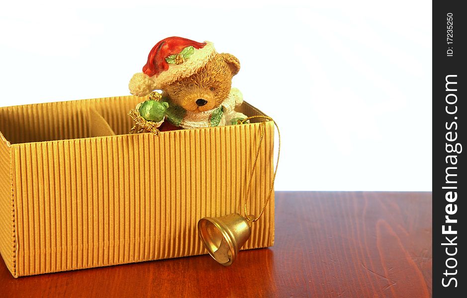 Bear as santa claus in box isolated on white. Bear as santa claus in box isolated on white