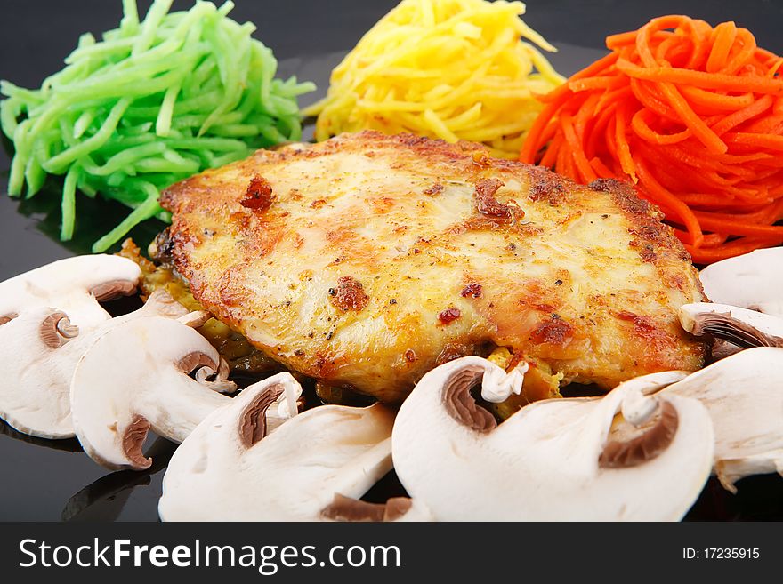Chicken breast and vegetables on white background. Chicken breast and vegetables on white background