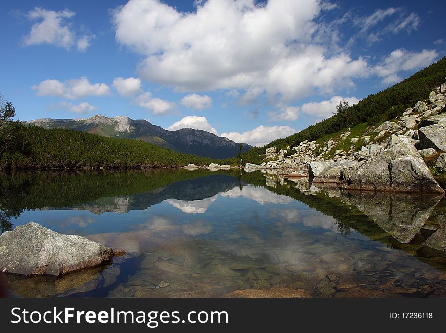 Mirror lake Cierne pleso in High Tatras, Slovakia.