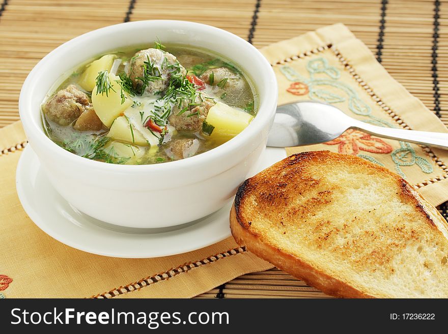 Goulash from the beef and the vegetables with the  toast