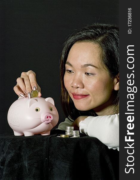 Close up woman and piggy bank. Close up woman and piggy bank