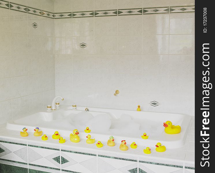 Bath tub with rubber ducks. Bath tub with rubber ducks
