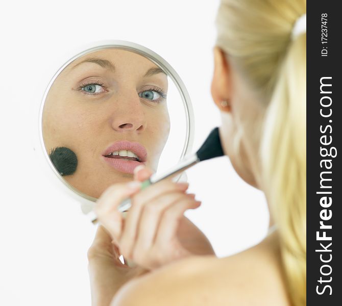 Portrait of young woman doing make up. Portrait of young woman doing make up