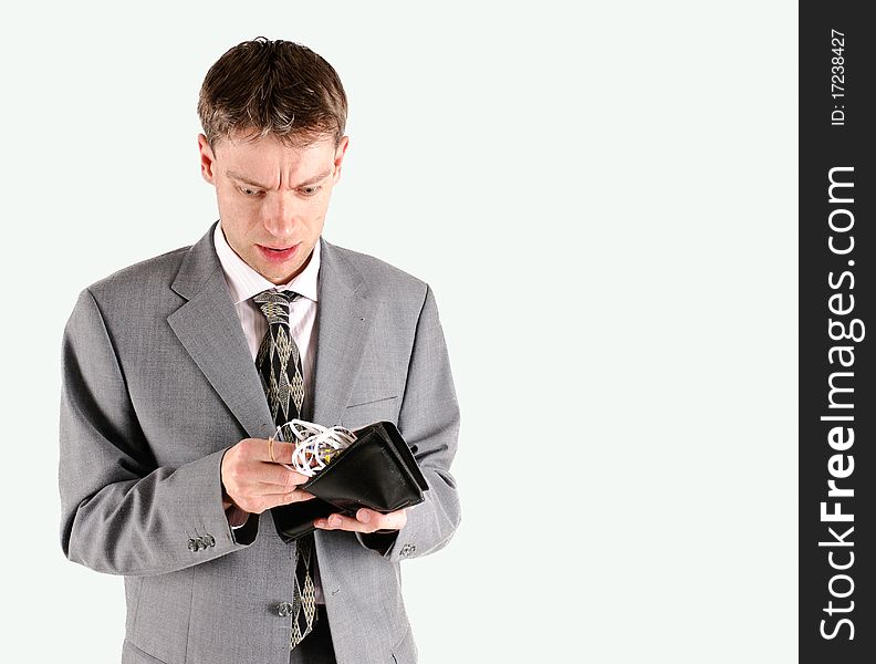 Businessman with shredded cash in wallet