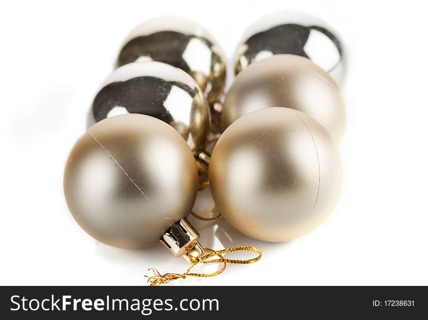 Six golden christmas decorative baubles isolated on white. Six golden christmas decorative baubles isolated on white