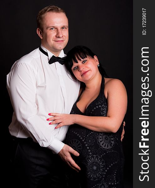 Beautiful young couple expecting their unborn child. Beautiful young couple expecting their unborn child