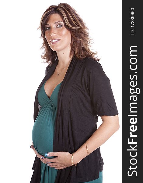 A pregnant woman holding her belly with a happy expression on her face. A pregnant woman holding her belly with a happy expression on her face.