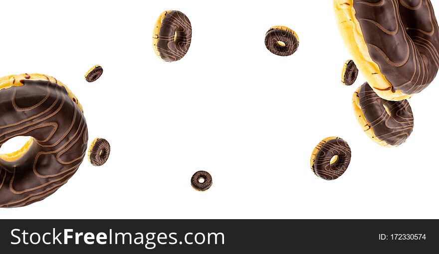 Cookie background. Glazed sweet doughnut falling on white. Sweet icing sugar food.