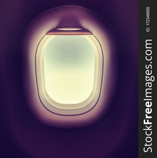 Deep blue sky in the airplane porthole