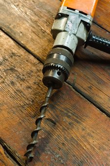 Electric Drill On Wood Stock Image