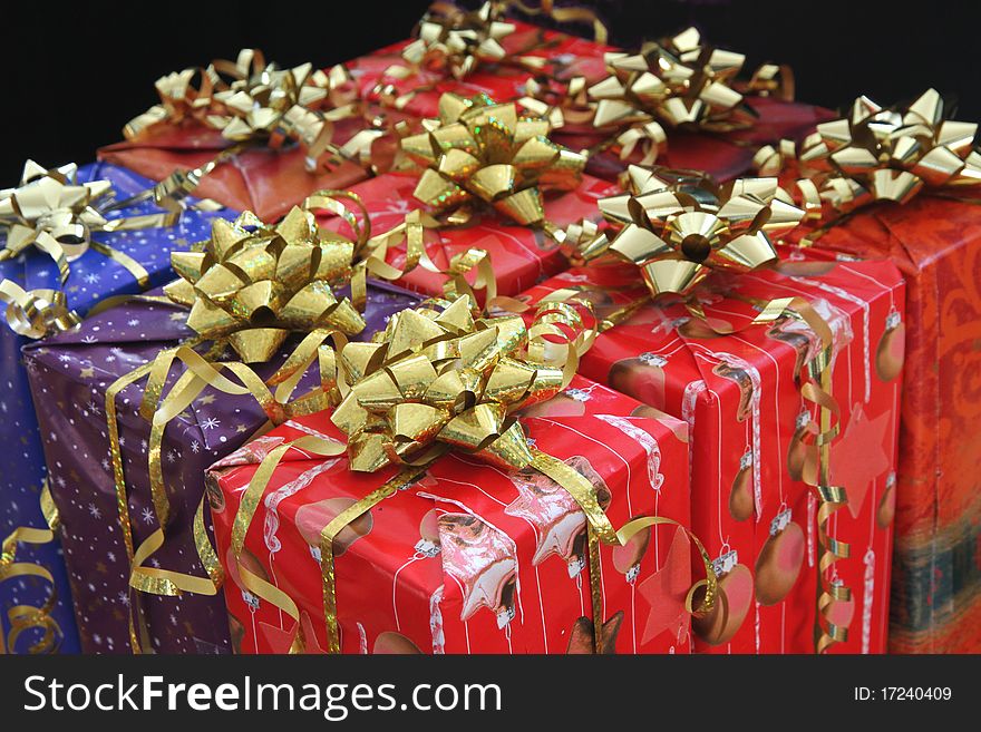 Nine Christmas Packages With Stars