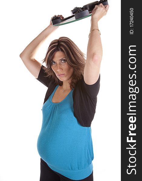 Pregnant woman throwing scales