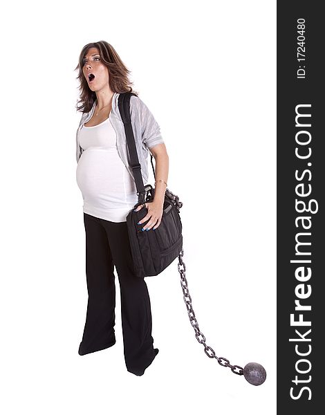 A pregnant business woman with her black bag and chain showing how tired she is by yawning. A pregnant business woman with her black bag and chain showing how tired she is by yawning.