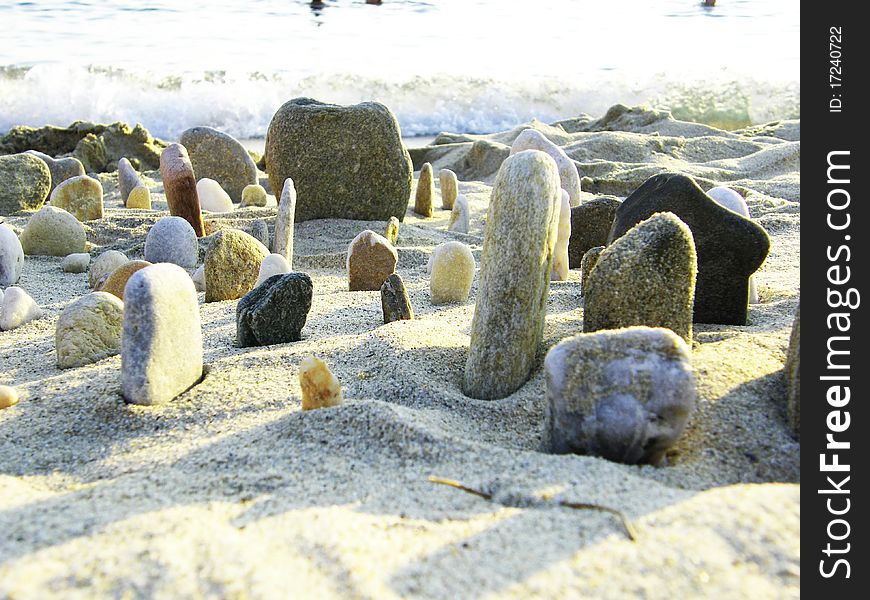 Pebbles in the sand on beach. Pebbles in the sand on beach