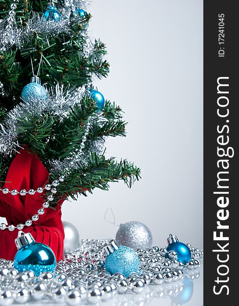 Blue balls hanging on a Christmas tree, white background. Blue balls hanging on a Christmas tree, white background