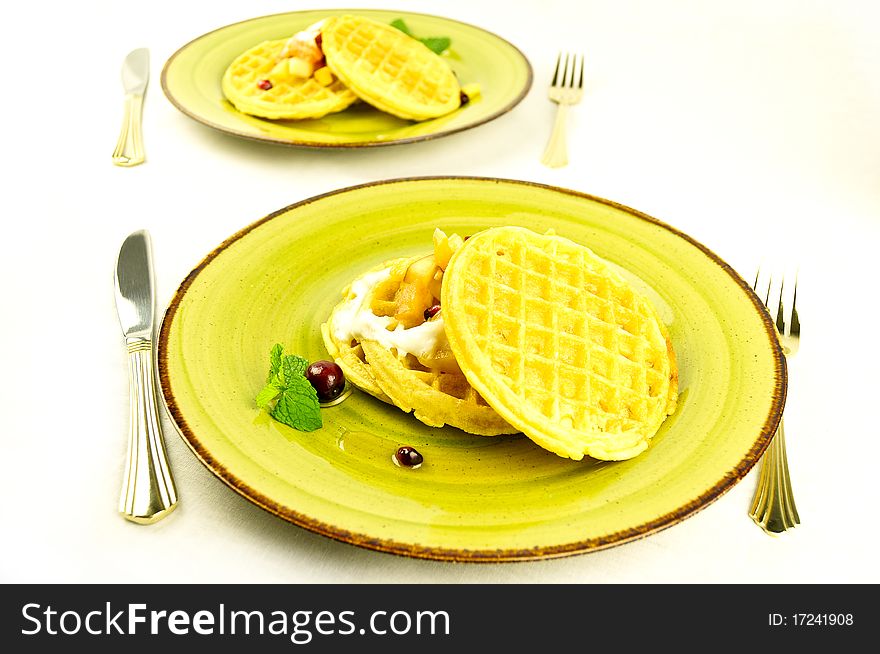 Waffles breakfast for two  on a white buckground. Waffles breakfast for two  on a white buckground