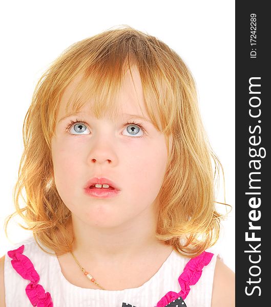 Cute little girl looking up. Isolated on white background. Studio shoot.