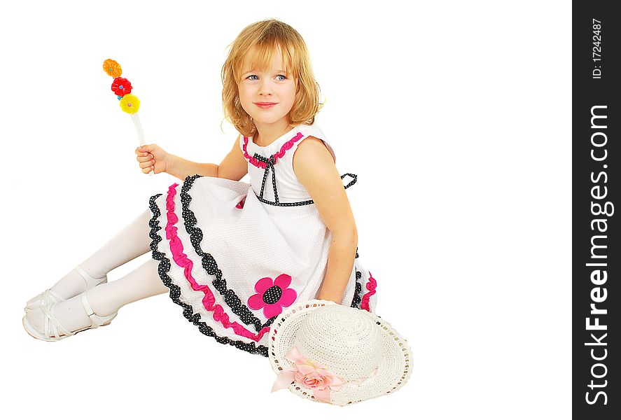 Portrait of little girl with lollipops isolated on the white background. Portrait of little girl with lollipops isolated on the white background.