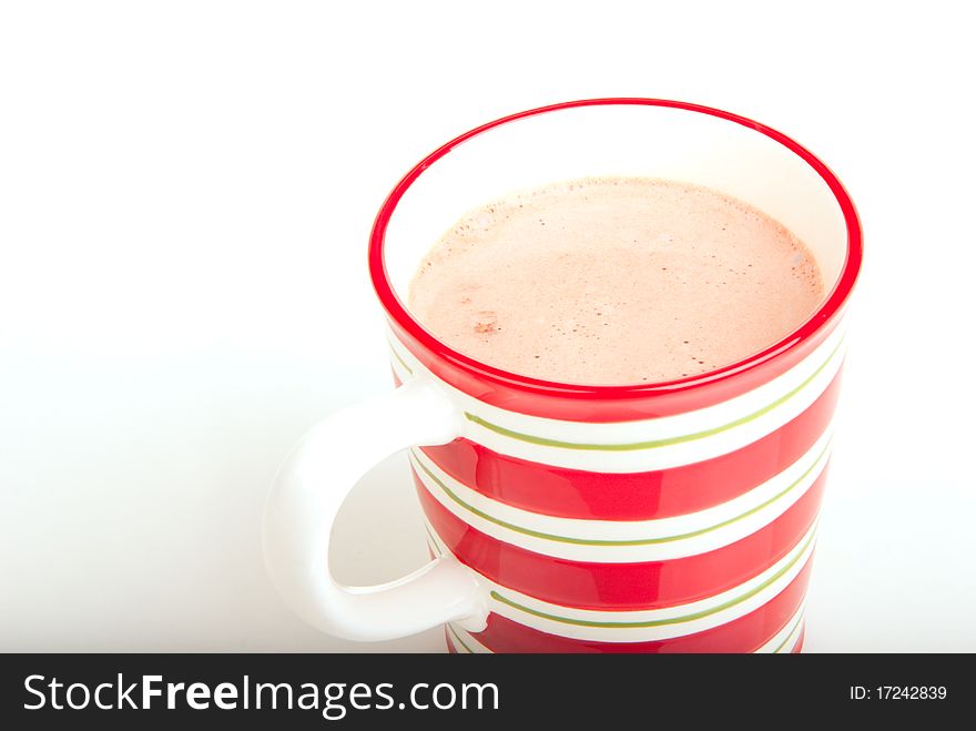 Red striped Christmas cup with with hot chocolate isolated on a white background. Red striped Christmas cup with with hot chocolate isolated on a white background