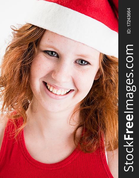 Beautiful teen girl in red and black santa costume