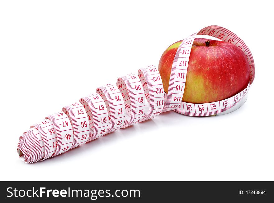 Red apple and Tape Measure close up