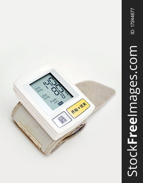 Blood pressure monitor on a white background. Blood pressure monitor on a white background
