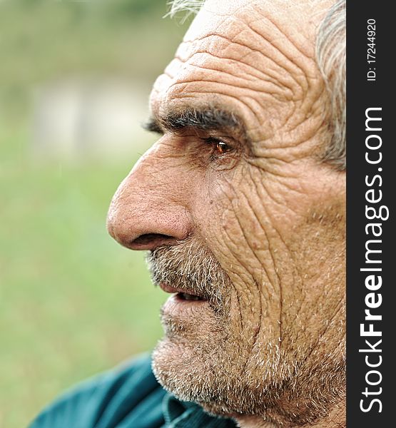 Senior man looking off into distance - profile