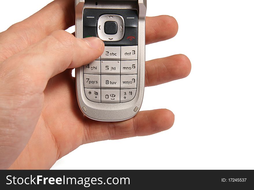 Cell phone in hand isolated on white