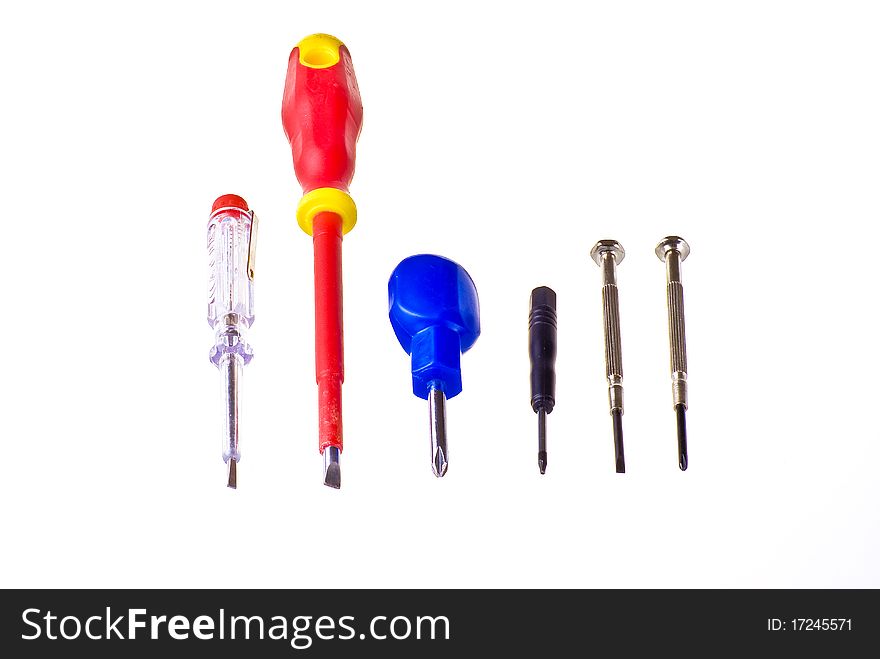 Various types of screwdrivers over white background