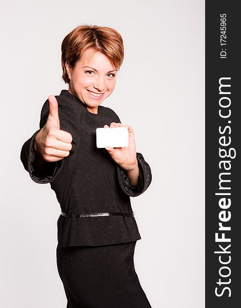 Close-up of a young woman showing thumbs up. Close-up of a young woman showing thumbs up