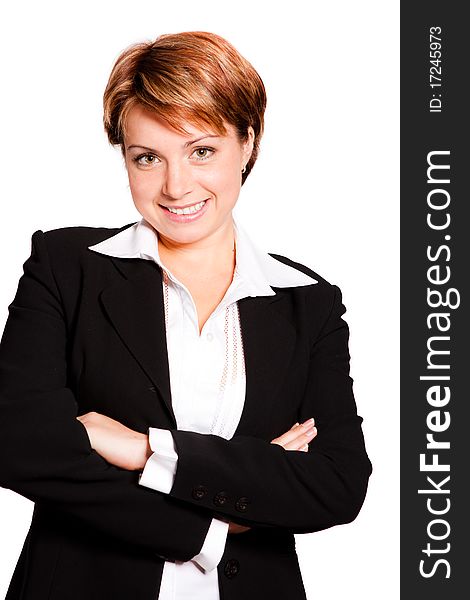 Beautiful businesswoman with her arms crossed on white background