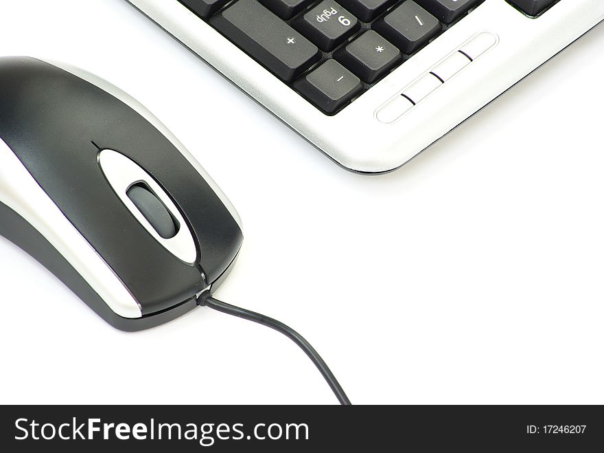 Computer mouse and keyboard isolated on white