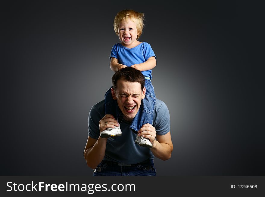 The portrait of a little boy and his father