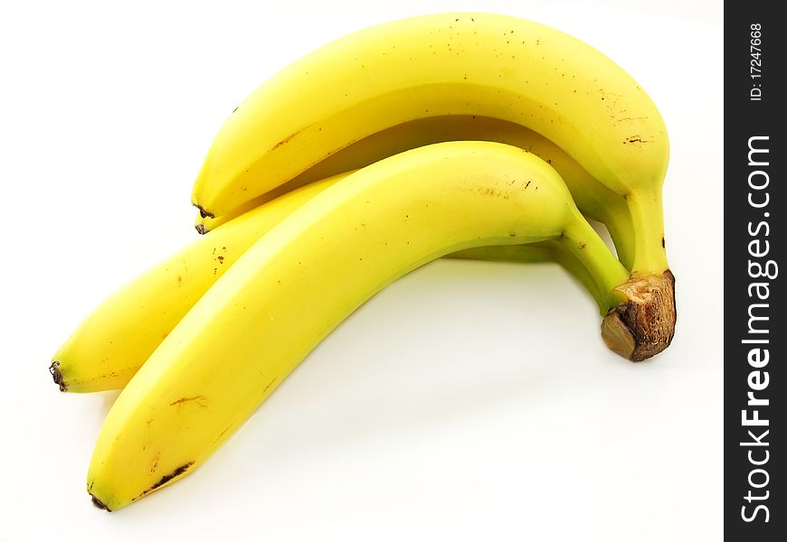 Group of bananas, connected towards white background