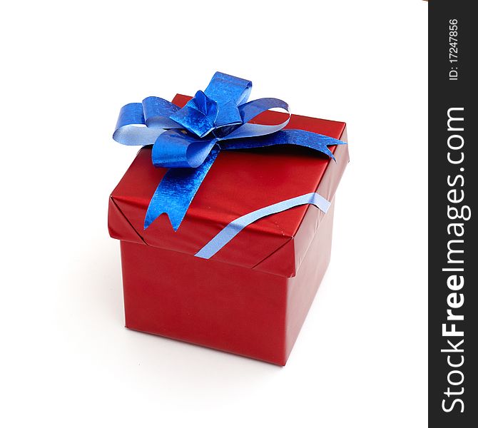 Red gift box with blue bow
