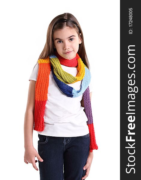 Cute little girl wearing multicolor scarf. Isolated