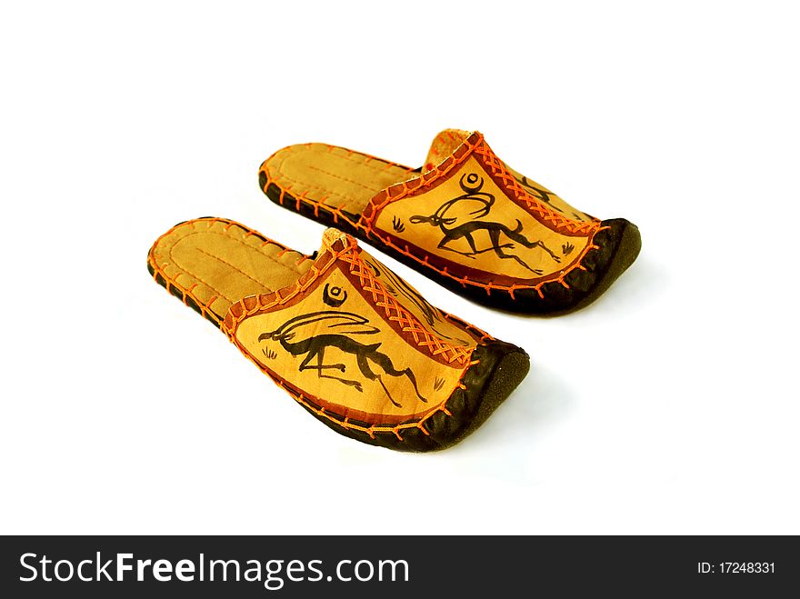 Mongolian leather slippers, isolated on white background. Mongolian leather slippers, isolated on white background