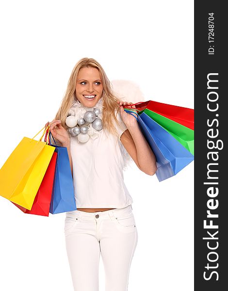 blond angel with some colored shopping bags. blond angel with some colored shopping bags