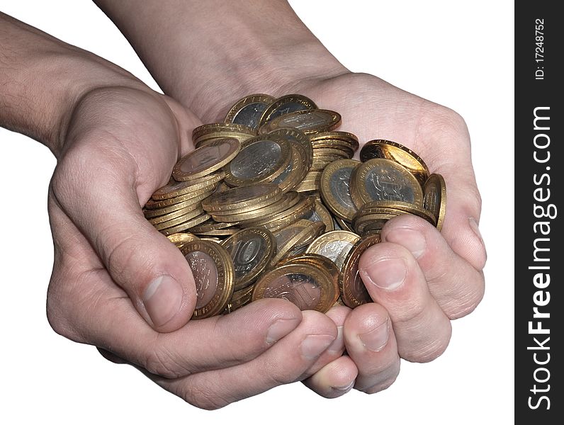 Full handful of coins on a white background