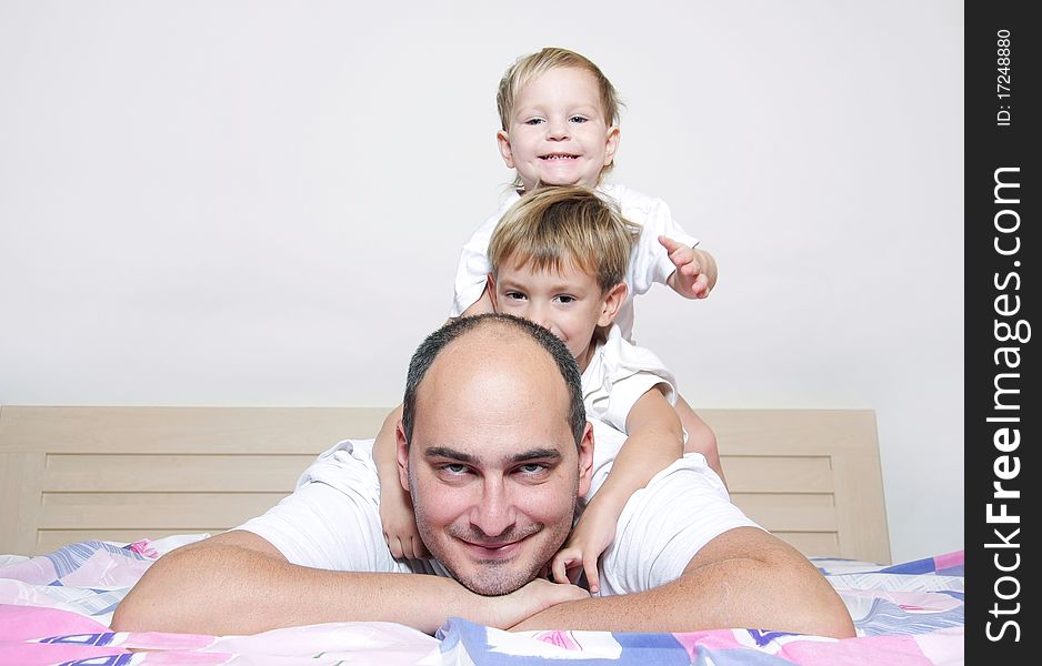 Father and two kids at home