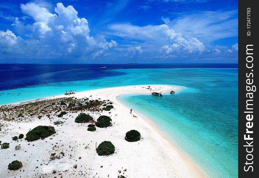 Aerial view of the stunning white sandbank with beautiful sandy beaches of Maldives