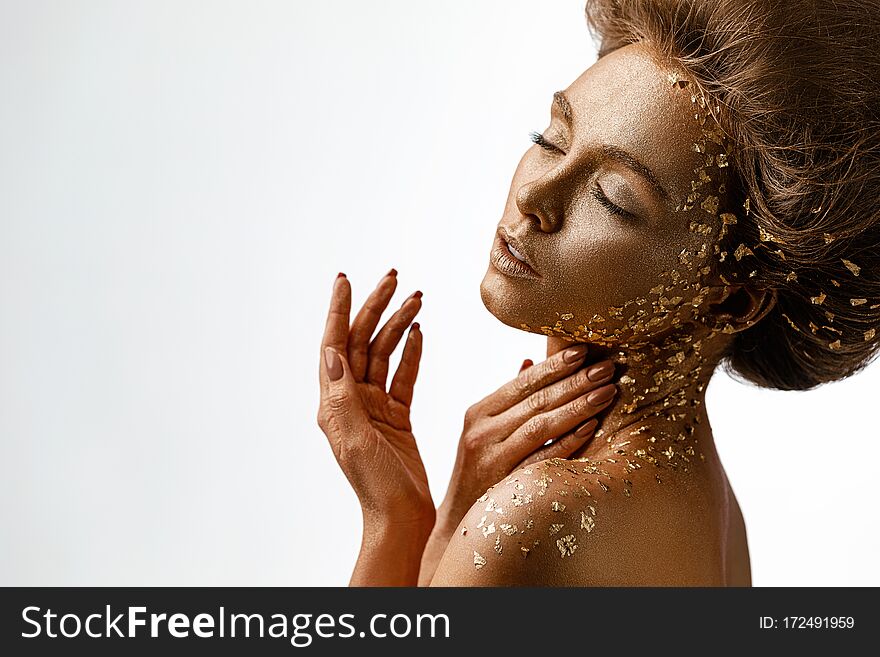 Model Girl With Holiday Golden Shiny Professional Makeup.