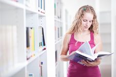 Pretty Female College Student In A Library Royalty Free Stock Photo Pretty Female College Student In A Library Royalty Free Stock Photo