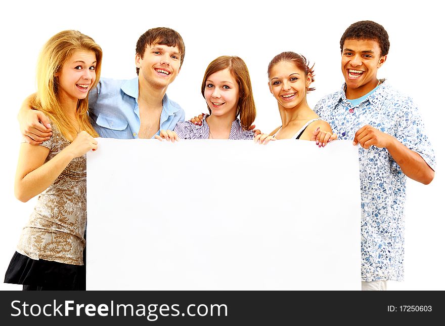 Portrait of happy men and women standing with a billboard against white background. Portrait of happy men and women standing with a billboard against white background